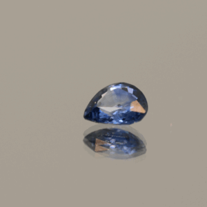 Blue pear-shaped sapphire, 0.62 carat, 5.70 × 5.31 × 2.44 mm, heat-treated, unknown origin, AIG certified.