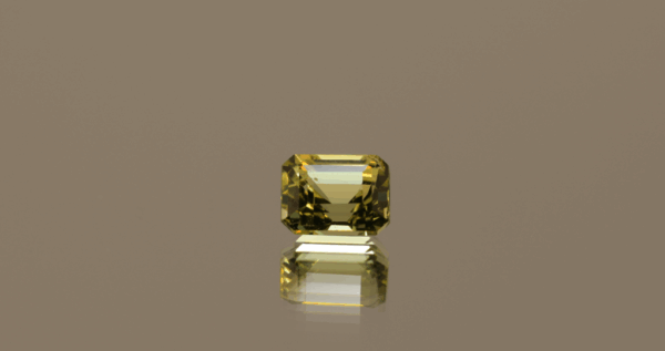 Natural octagon cut chrysoberyl gemstone with yellow color, 6.05 × 4.78 mm