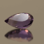 Natural pear cut amethyst gemstone with purple violet color, 16.10 × 10.70 mm