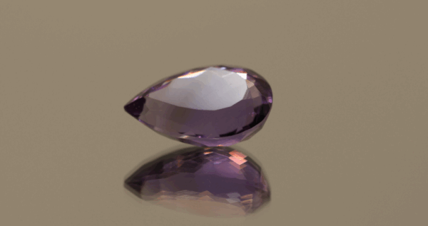Natural pear cut amethyst gemstone with purple violet color, 16.10 × 10.70 mm