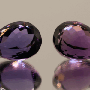 Natural pear cut amethyst gemstones with purple violet color, 16.40–17.20 × 11.20–12.10 mm
