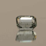 Light green octagon-shaped spodumene, 11.9 carat, 10.9 × 8.2 × 6.4 mm, no treatment, unknown origin.