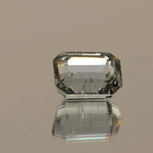Light green octagon-shaped spodumene, 11.9 carat, 10.9 × 8.2 × 6.4 mm, no treatment, unknown origin.