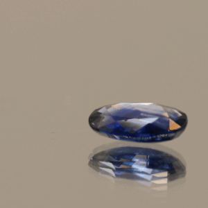Blue sapphire crystal gemstone 1.42 carat oval cut, heat-treated, Madagascar origin, dimensions 8.66 × 5.43 × 2.85 mm, AIG certified.