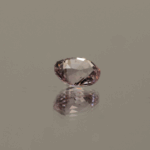 Padparadscha sapphire oval cut 1.03 carat, untreated, unknown origin, dimensions 6.39 × 4.9 × 3.79 mm, AIG certified.