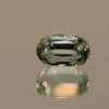Light green cushion-shaped spodumene, 5.92 carat, 12.3 × 7.8 × 7.3 mm, no treatment, unknown origin.