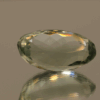 Natural prasiolite gemstone, 15.77 carat, oval cut, pale green color, untreated, loose gemstone, dimensions 20.9 × 12.1 × 9.5 mm, ideal for fine jewelry.