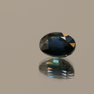 Oval Blue sapphire, 1.26 carat, 7.12 × 5.21 × 3.71 mm, heat-treated, unknown origin, IGI certified.
