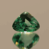 Light green trillion-shaped spodumene, 9.25 carat, 14 × 6.5 × 9.6 mm, no treatment, unknown origin.