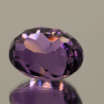 Natural oval cut amethyst gemstone with purple violet color, 15.00 × 10.60 mm
