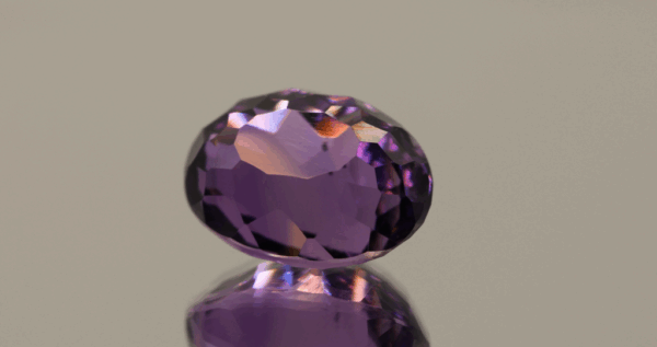 Natural oval cut amethyst gemstone with purple violet color, 15.00 × 10.60 mm