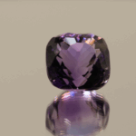 Natural cushion cut amethyst gemstone with purple violet color, 12.70 × 12.40 mm