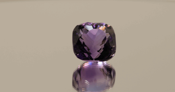 Natural cushion cut amethyst gemstone with purple violet color, 12.70 × 12.40 mm