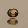 Light brown round-shaped topaz, 4.76 carat, 10 × 10 × 6.8 mm, no treatment, unknown origin.