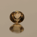 Light brown round-shaped topaz, 4.76 carat, 10 × 10 × 6.8 mm, no treatment, unknown origin.