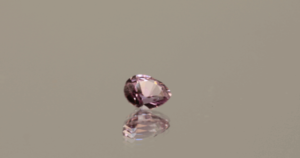 Pink sapphire gemstone, 0.54 carat, pear cut, heat treated, loose gemstone, dimensions 5.40 × 4.44 × 3.08 mm, GIA certified.