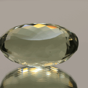 Natural prasiolite gemstone, 27.44 carat, oval cut, pale green color, untreated, loose gemstone, dimensions 23 × 14.1 × 13 mm, ideal for fine jewelry.