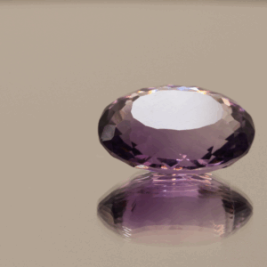 Natural oval cut amethyst gemstone with purple violet color, 15.70 × 11.30 mm