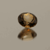 Faceted light brown Topaz gemstone, round cut, 4.33 carats, excellent clarity, ideal for fine jewelry.