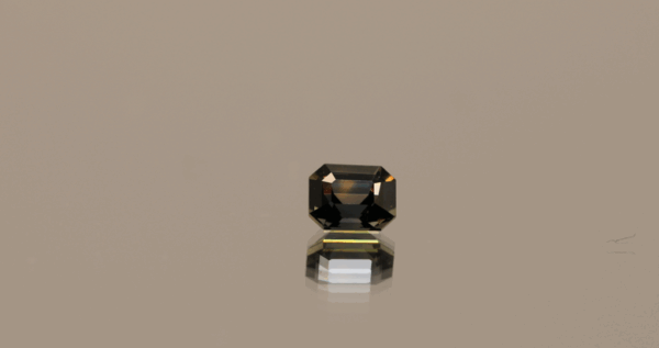 Natural sapphire gemstone, 0.58 carat, octagon cut, blue to purple color, unheated, loose gemstone, dimensions 4.89 × 3.95 × 3.17 mm, origin Madagascar, AIG certified.