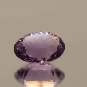 Natural oval cut amethyst gemstone with purple violet color, 14.70 × 12.10 mm