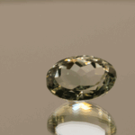 Natural prasiolite gemstone, 5.1 carat, oval cut, pale green color, untreated, loose gemstone, dimensions 12.8 × 9.4 × 6.9 mm, ideal for fine jewelry.