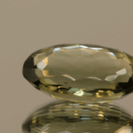 Natural prasiolite gemstone, 14.12 carat, oval cut, pale green color, untreated, loose gemstone, dimensions 21.1 × 13.3 × 7.8 mm, ideal for fine jewelry.