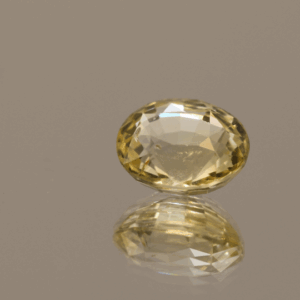 Yellow Sri Lanka sapphire 2.1 carat oval cut, untreated, Sri Lanka origin, dimensions 7.95 × 6.67 × 4.4 mm, GFCO certified.
