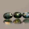 Set of three green-blue sapphires 2.83 carat total, oval cut, heat-treated, Madagascar Sapphire origin, dimensions 7.09 × 5.15 × 3.01 mm, GFCO certified.