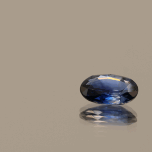 Natural sapphire gemstone, 0.72 carat, oval cut, royal blue color, heat-treated, loose gemstone, dimensions 6.73 × 4.95 × 2.29 mm, origin Madagascar, IGS certified.