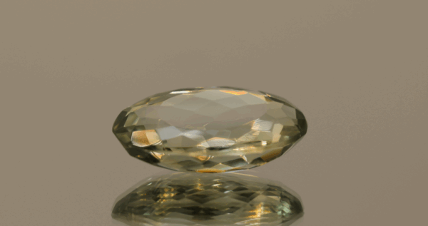 Natural prasiolite gemstone, 11.5 carat, oval cut, pale green color, untreated, loose gemstone, dimensions 20 × 12.7 × 6.7 mm, ideal for fine jewelry.