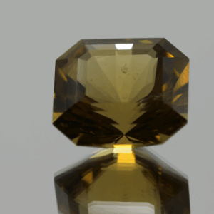 Natural octagon cut citrine gemstone with yellow-orange color, 16.3 × 15.1 mm