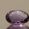 Natural oval cut amethyst gemstone with purple violet color, 15.40 × 11.50 mm