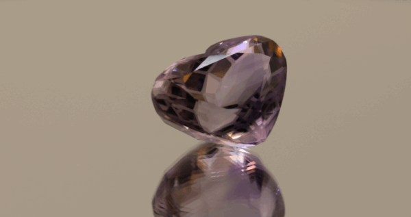Natural heart cut amethyst gemstone with purple violet color, 18.15 × 14.12 mm
