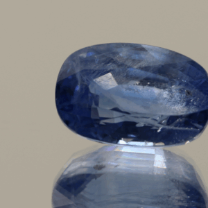 Blue sapphire gemstone, 8.65 carat, oval cut, heat treated, Sri Lanka origin, loose gemstone, dimensions 13.03 × 8.62 × 7.66 mm, AIG certified.