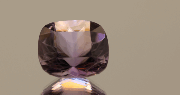 Natural cushion cut amethyst gemstone with purple violet color, 16.00 × 13.60 mm