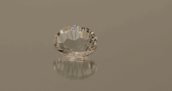 Colorless oval-shaped topaz, 6.74 carat, 12.2 × 9.6 × 7.6 mm, no treatment, unknown origin.