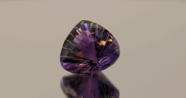 Natural pear cut amethyst gemstone with purple violet color, 15.70 × 14.60 mm