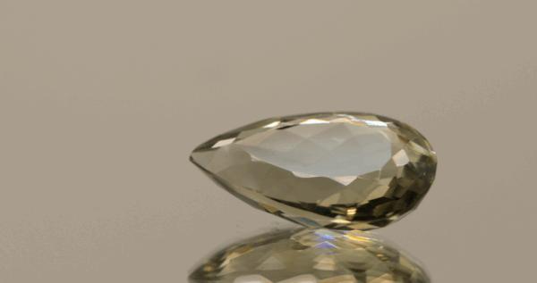 Natural prasiolite gemstone, 9.91 carat, pear cut, pale green color, untreated, loose gemstone, dimensions 19.2 × 12 × 6.9 mm, ideal for fine jewelry.