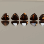 Natural almandine garnets, 5.5 carats total, trillion cut, purple-red color, untreated, set of 6