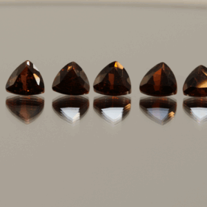 Natural almandine garnets, 5.5 carats total, trillion cut, purple-red color, untreated, set of 6