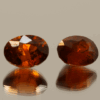 Set of 2 natural spessartite garnets, 8.5 carats total, oval cut, orange-red color, untreated