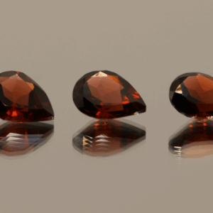 Natural spessartite garnets, 5.23 carats each, pear cut, orange-red color, untreated, set of 3