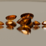 Natural hessonite garnet gemstones 8.7 carats mixed cuts orange color untreated loose stones set