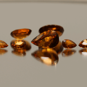 Natural hessonite garnet gemstones 8.7 carats mixed cuts orange color untreated loose stones set