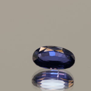 Violetish blue. Sapphire Color Change Oval gemstone with color change effect, 1.16 carat, oval cut, untreated, loose gemstone, dimensions 7.89 × 4.80 × 3.21 mm, IGI certified.