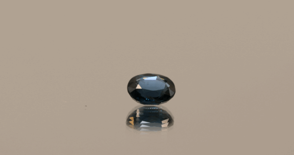 Deep blue spinel stone, oval-shaped 1.07 carat, 6.76 × 5.48 × 3.34 mm, no treatment, unknown origin, ALGT certified.