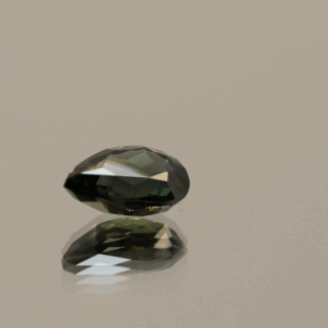 Greenish blue to purplish red pear-shaped color change sapphire, 1.32 carat, 7.93 × 5.56 × 3.33 mm, no treatment, Madagascar origin, AIG certified.