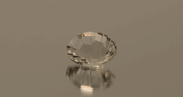 Colorless oval-shaped topaz, 5.57 carat, 12.9 × 10.2 × 7.6 mm, no treatment, unknown origin.