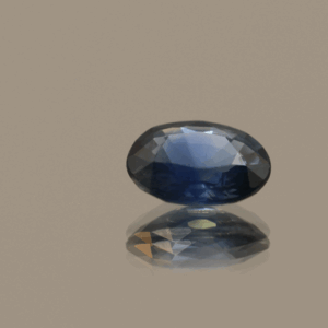 Blue sapphire gemstone, 0.98 carat, oval cut, heat-treated, loose gemstone, dimensions 7 × 5.31 × 2.98 mm, origin unknown, AIG certified.